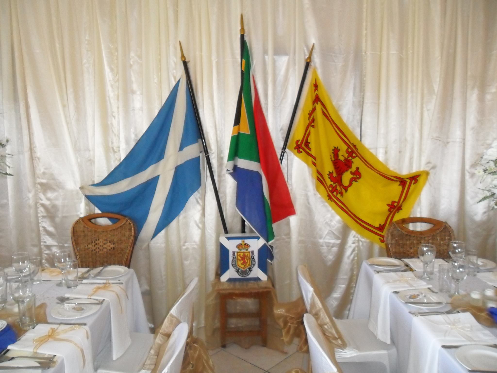 Scottish and South African flags at a Society event